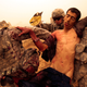 Image for article titled The Unflinching War Photography of Chris Hondros